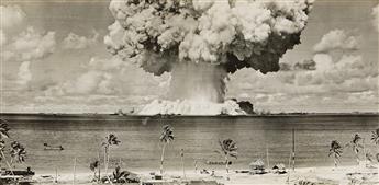 (NUCLEAR TESTING) Two photographs depicting atomic bomb testing, one a rare aerial shot, from Bikini Atoll. 1946.